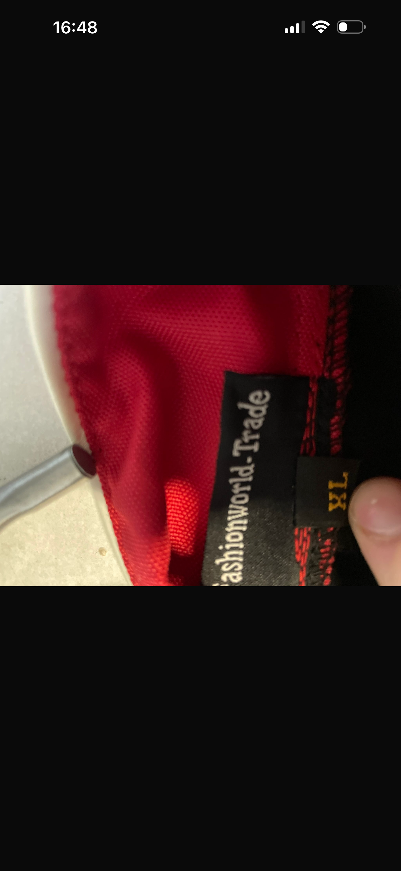 FashionWorld Kinky Glossy Black Long Coat with Red Accents – Size XL